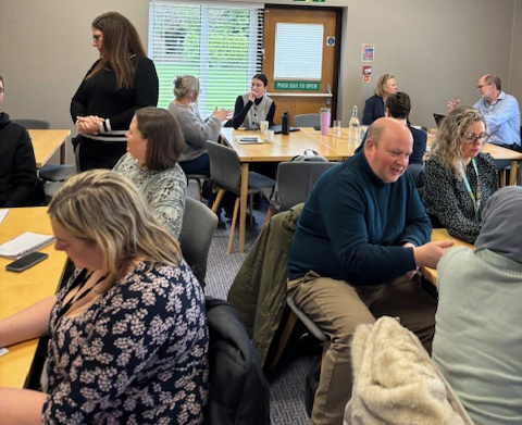 Image of commissioners CoP meeting in session